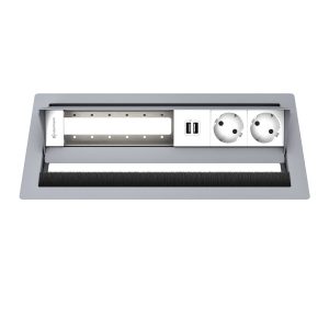 Kindermann CablePort standard² Tischeinbaugehäuse 6-fach, 2x Strom 2x USB 7492000182 Maximale Konnektivität für professionelle Arbeitsumgebungen! Das Kindermann Tischeinbaugehäuse ist die ideale Lösung für eine ordentliche, flexible und effiziente Medienintegration in Konferenzräumen, Büros und Schulungsräumen. Mit seinem modularen Aufbau und der hochwertigen Verarbeitung ermöglicht es eine maßgeschneiderte Ausstattung mit Strom-, Netzwerk-, USB- und AV-Anschlüssen. Elegantes & platzsparendes Design – diskrete Integration in Tische & Möbel für eine aufgeräumte Arbeitsumgebung Hochwertige Verarbeitung – robust & langlebig, ideal für den täglichen professionellen Einsatz Einfache & schnelle Installation – unkomplizierter Einbau in Konferenztische, Schreibtische & Medieneinheiten Leergehäuse mit 2 x Strom (Schuko) 2x USB pulverbeschichtet RAL 9006 Einbautiefe 65 mm Für Tischplatten von 12-48 mm Stärke Netzanschluss mit 3-poligem GST 18 Stecker Mit dem Kindermann Tischeinbaugehäuse lassen sich Arbeitsplätze optimal vernetzen – für effiziente Meetings, Präsentationen und digitale Zusammenarbeit.